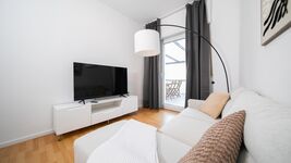 Wohnzimmer mit Zugang zur Terrasse