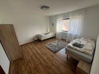 Große Monteurwohnung mit 3 Schlafzimmern, Balkon und WLAN Bild 11