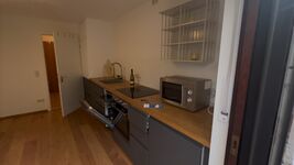 Appartement mit Wohnküche+ Bad + Terrasse + Garten mit Sauna Bild 5