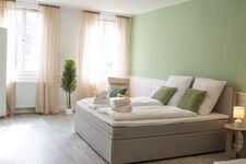 Schlafzimmer für 4 Personen mit zwei Doppelbetten