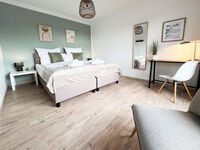 Das Schlafzimmer 02 in Norderstedt Mitte mit Arbeitsplatz.