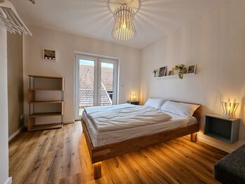 BETTER I modern apartment I Tischkicker Bild 3
