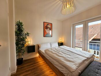 BETTER I modern apartment I Tischkicker Bild 4