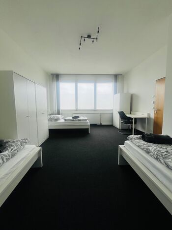 Schlafzimmer 1 (3 Einzelbetten