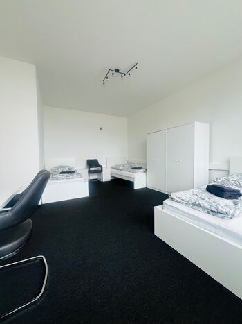 Schlafzimmer 1 (3 Einzelbetten)