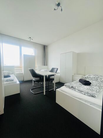 Schlafzimmer 2 (3 Einzelbetten)