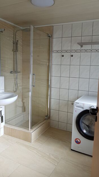 Sanitär mit Waschmaschine Ferienwohnung