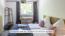 Modern | sauber | großer Fernseher | Einzelbetten Bild 8
