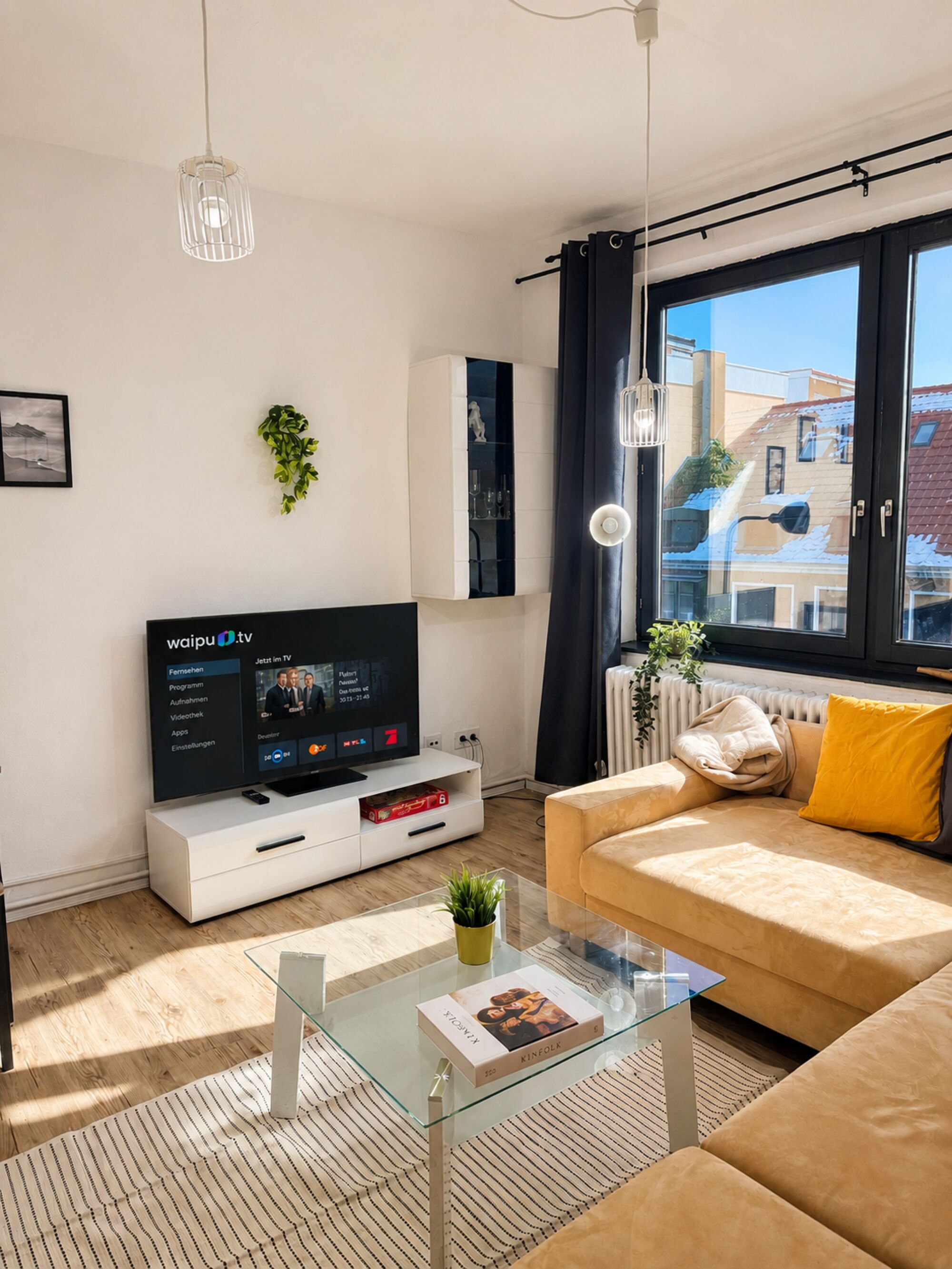 Wohnzimmer mit Schlafsofa 