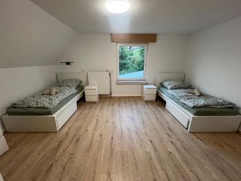Schlafzimmer 1 - 2 Einzelbetten