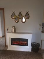 Wohnzimmer mit elektrischem Kamin