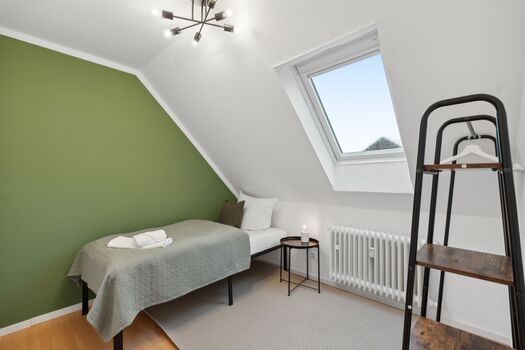 Schlafzimmer mit einem Einzelbed