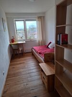 Schlafzimmer mit Einzelbeztt