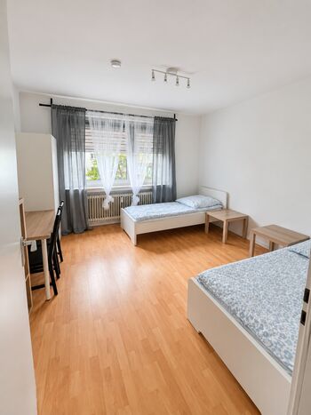 Hometime24 in Neu-Isenburg – Einzelbetten Bild 4