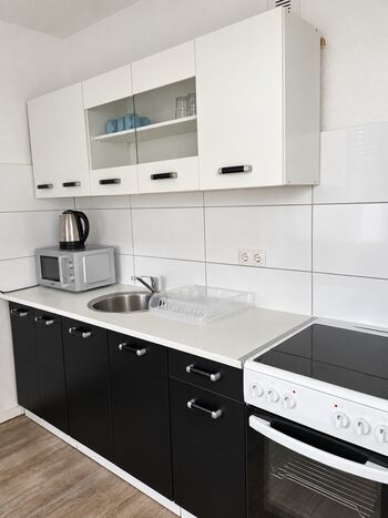 Hometime24 in Ingolstadt – Einzelbetten Bild 5