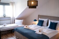 Schlafzimmer 1 - Doppelbett und Zustellbett