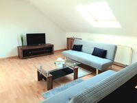 Wohnzimmer mit 2 Schlafsofas