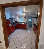 Blick vom Esszimmer zur Küche 