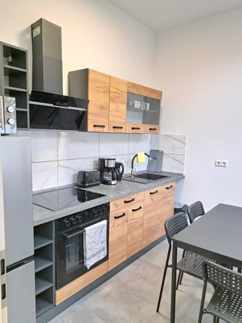 14 BETTEN IM HAUS, WLAN, gute Lage-Gemütliche Monteurwohnung