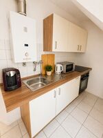 Bis zu 2 Personen - Wohnung + Balkon Bild 10