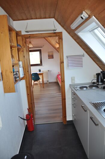 Schöne DG-Wohnung mit Gartensitzplatz Bild 2