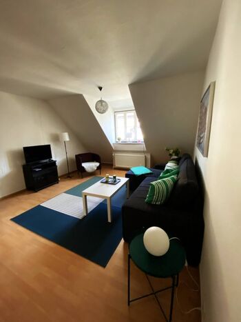 Wohnzimmer mit zusätzlicher Schlafmöglichkeit