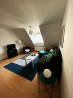 Wohnzimmer mit zusätzlicher Schlafmöglichkeit