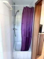 Pluto: Dusche