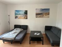 Wohnzimmer mit 2x Klappcouch