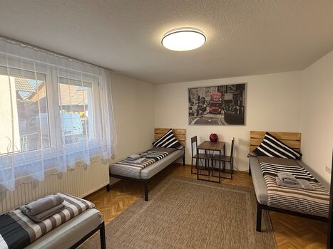 ARCOS Wohnung–Geräumige 3-Zimmer-Wohnung mit 8 Einzelbetten Bild 2