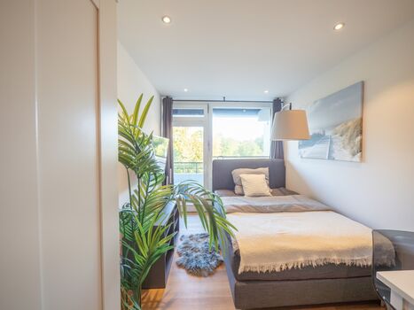 Ferienwohnung in Malente für 1 Person mit - Balkon & Parkplatz Bild 1