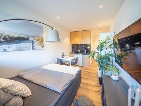 Ferienwohnung in Malente für 1 Person mit - Balkon & Parkplatz Bild 2