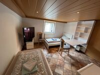 Wohnraum mit Fernseher