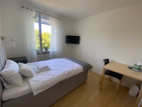 kleines 1-Bett-Zimmer