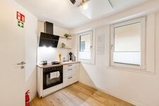 Herd mit Backofen und Kochzubehör