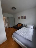 Wohnung 1, Schlafraum mit einem Bett