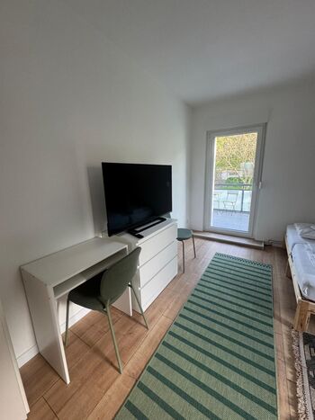 Moderne Unterkunft für Monteure mit Balkon und voll ausgestatteter Küche Bild 5