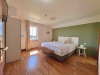 Schlafzimmer 3 mit Bad en Suite