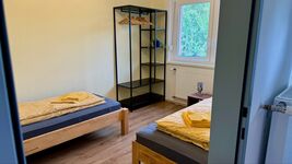 Schlafzimmer mit 2 Einzelbetten