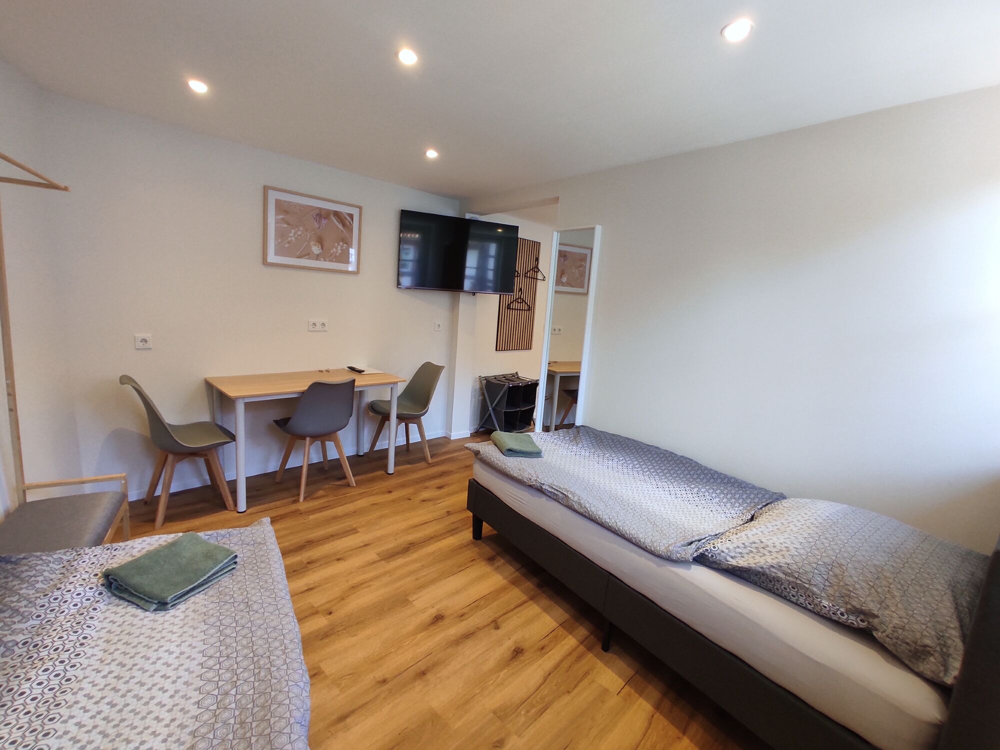 3 Bett Zimmer