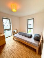 Neubau! Voll möbilierte 3-Zimmer-Wohnung mit Einbauküche Zdjęcie 1