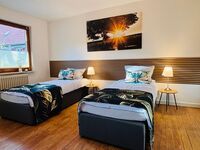 Workers Lodge 4-14 Pers. 2 App., Einzelbetten, Parkplatz Bild 10