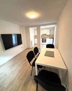 Esszimmer mit Fernseher