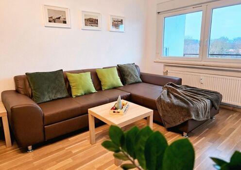 Wohnzimmer mit Schlafsofa 