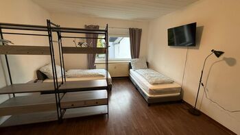 Zentrales Apartment I DIREKT am Flughafen Dortmund I B1 Bild 2