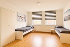 Crew-Apartments Merseburg | Monteurzimmer mit Einzelbetten Bild 8