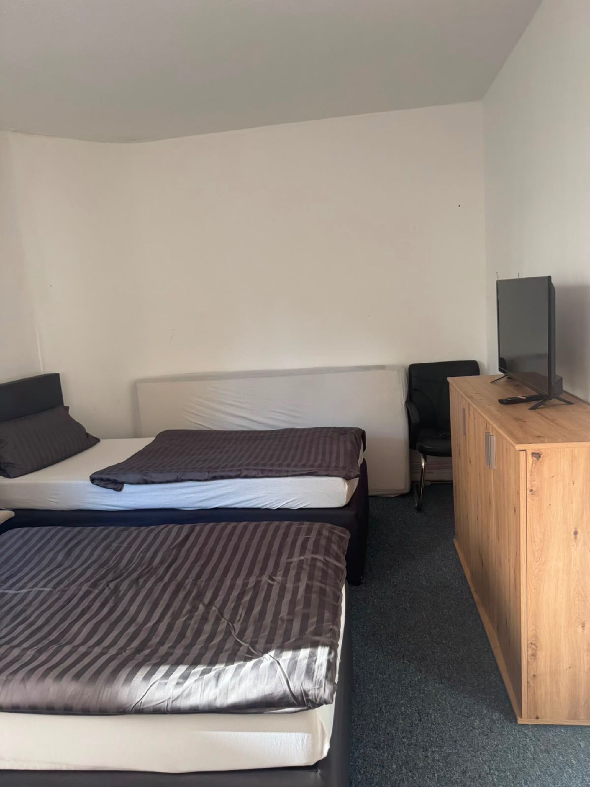 Doppelzimmer mit Doppelbetten 