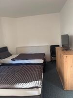 Doppelzimmer mit Doppelbetten 