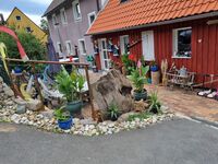 Haus (links DG und rechta EG/DG)