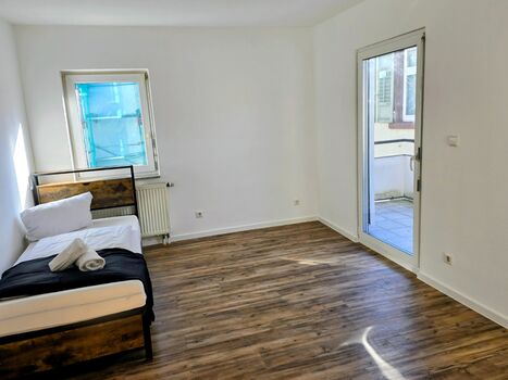 Schlafzimmer mit Balkon